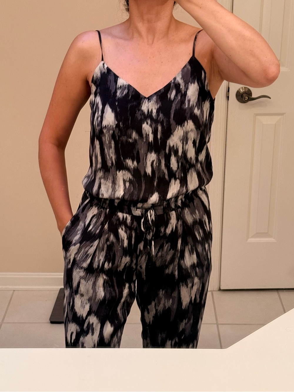Haute Hippie Black and White V-Neck Strap Jumpsuit.  Size S